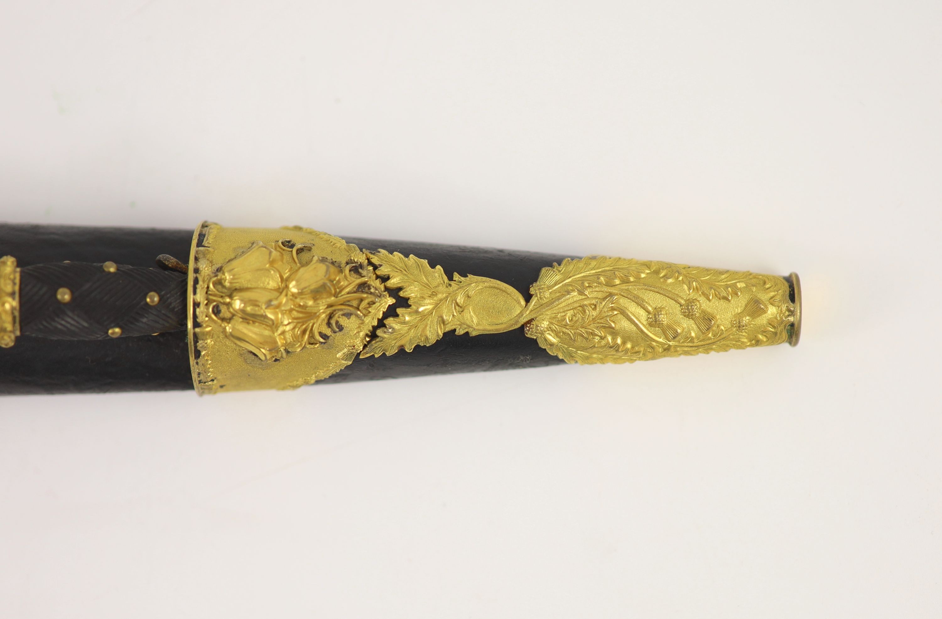 A 19th century Scottish ormolu mounted dirk and a similar skean dubh